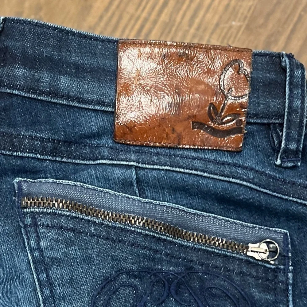Vintage designer jeans size 28. Not sure the brand